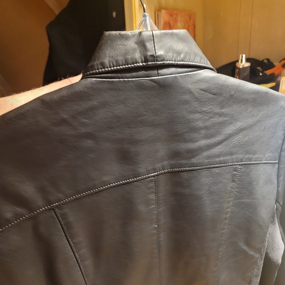 Faux leather jacket.  With material on arms. Very cute - Picture 9 of 12